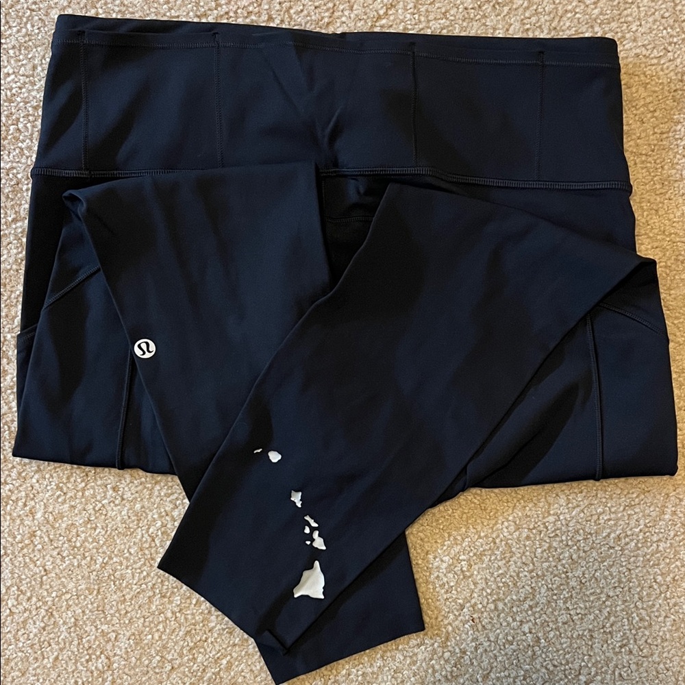 Lululemon Fast and Free 23’ Black Leggings with Hawaiian Islands on back calf